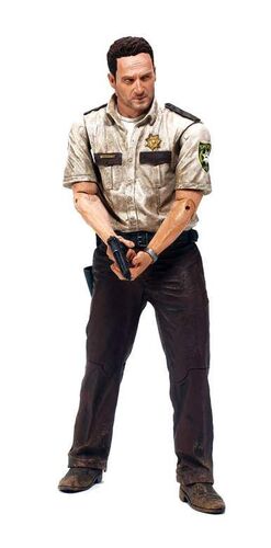 WALKING DEAD FIG 18CM SERIE 1 - DEPUTY RICK GRIMES                         