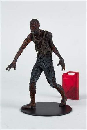 THE WALKING DEAD TV VERSION SERIE 5 FIG 15CM - CHARRED ZOMBIE              