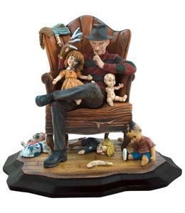 FREDDY KRUEGER EN SILLON ESTATUA RESINA 28CM                               