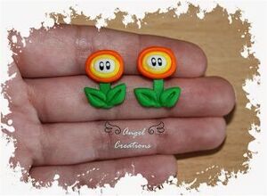 ANGEL CREATIONS PAR PENDIENTES FLOR MARIO                                  